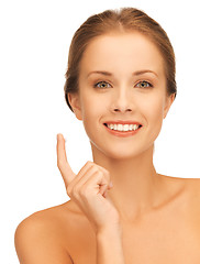 Image showing beautiful woman with moisturizing creme drop