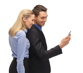 Image showing man and woman reading sms