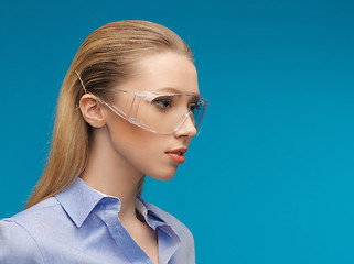 Image showing businesswoman in protective glasses