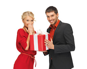 Image showing man and woman with present