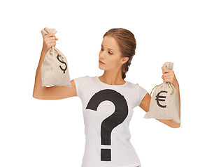 Image showing woman with dollar and euro signed bags