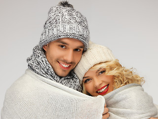 Image showing family couple under warm blanket