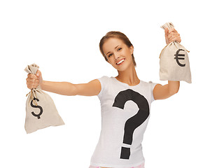 Image showing woman with dollar and euro signed bags