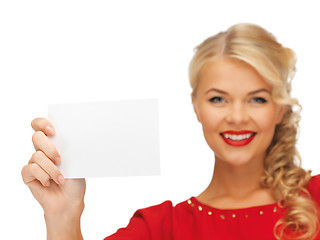 Image showing lovely woman in red dress with note card