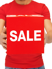 Image showing man holding sale sign