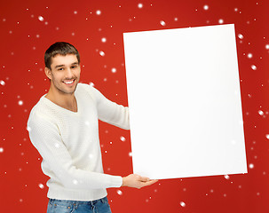 Image showing handsome man with big blank board