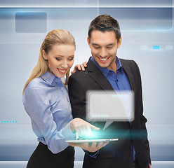 Image showing man and woman with tablet pc