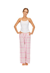 Image showing happy and smiling woman in cotton pajamas