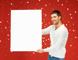 Image showing handsome man with big blank board