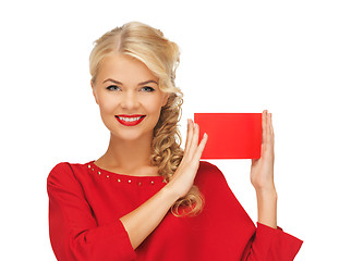 Image showing lovely woman in red dress with note card