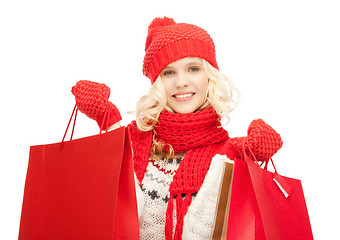 Image showing young girl with shopping bags