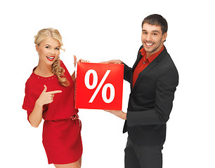 Image showing man and woman with percent sign