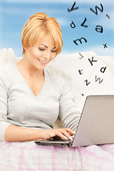 Image showing happy woman with laptop computer