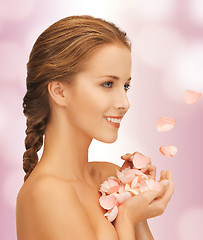 Image showing beautiful woman with rose petals