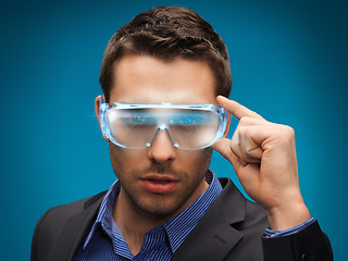Image showing businessman with digital glasses