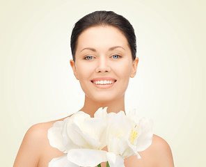 Image showing lovely woman with orchid flower