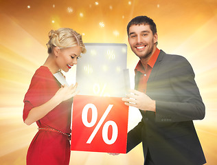 Image showing man and woman with percent sign