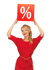 Image showing lovely woman in red dress with percent sign