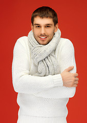 Image showing handsome man in warm sweater and scarf