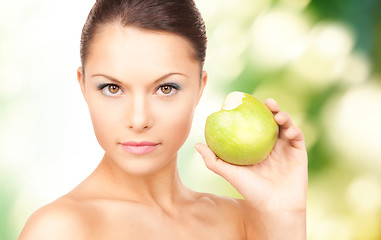 Image showing young beautiful woman with green apple