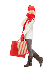 Image showing young girl with shopping bags