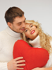 Image showing family couple in a sweaters with heart