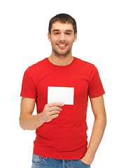 Image showing handsome man with note card