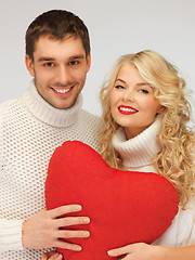 Image showing family couple in a sweaters with heart