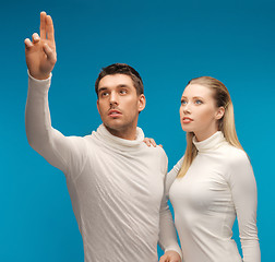 Image showing man and woman working with something imaginary