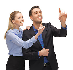 Image showing man and woman working with something imaginary