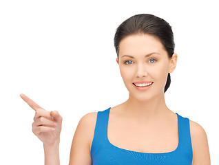 Image showing beautiful woman pointing her finger