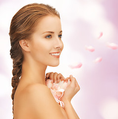 Image showing beautiful woman with rose petals