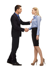 Image showing man and woman shaking their hands