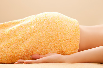 Image showing woman lying on massage table