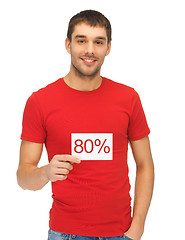 Image showing handsome man with discount card