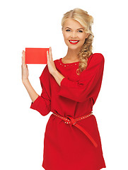 Image showing lovely woman in red dress with note card