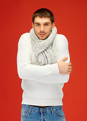 Image showing handsome man in warm sweater and scarf