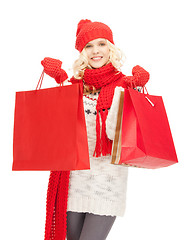 Image showing young girl with shopping bags