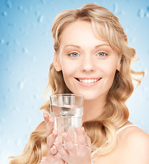 Image showing woman hands holding glass of water