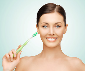 Image showing woman with toothbrush