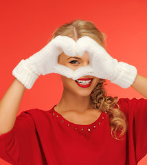 Image showing lovely woman showing heart shape