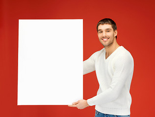 Image showing handsome man with big blank board