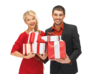 Image showing man and woman with gift boxes