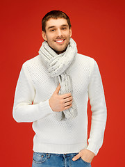 Image showing handsome man in warm sweater and scarf