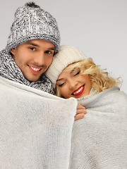 Image showing family couple under warm blanket