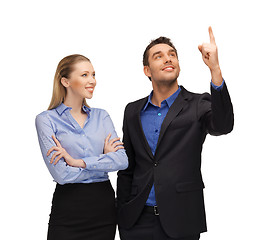 Image showing man and woman pointing their fingers