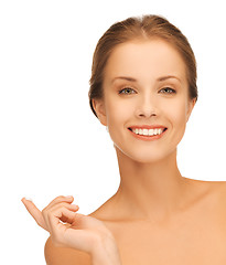 Image showing beautiful woman with moisturizing creme drop