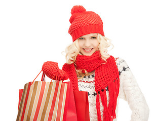 Image showing young girl with shopping bags
