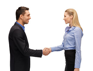 Image showing man and woman shaking their hands