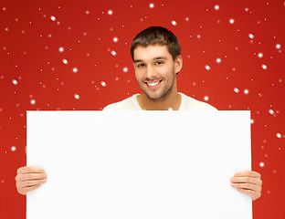 Image showing handsome man with big blank board